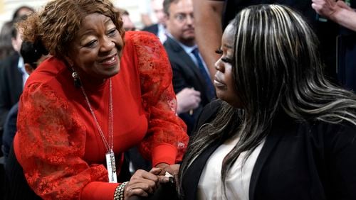 Former Fulton County election worker Ruby Freeman, left, talks to her daughter Wandrea"Shaye" Moss, a former Georgia election worker, after Moss testified before a U.S. House select committee during its fourth hearing on its investigation into the attack on the U.S. Capitol on Jan. 6, 2021. The State Election Board on Tuesday formally dismissed a complaint that Freeman and Moss had participated in election fraud while counting ballots during the 2020 presidential election. (Yuri Gripas/Abaca Press/TNS)