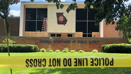 The Georgia Department of Public Safety headquarters on United Avenue suffered broken windows and was tagged with graffiti following a protest that turned violent early Sunday.