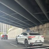 A Waymo vehicle on the Downtown Connector in Atlanta on Wednesday, April 17, 2024.