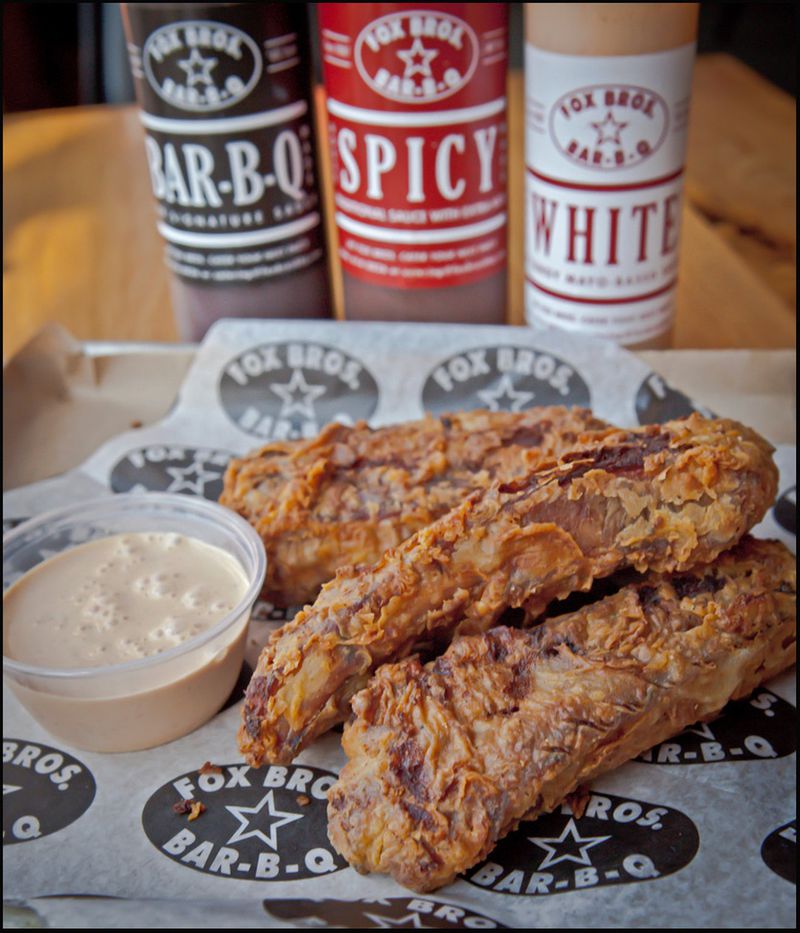 Fox Bros. Bar-B-Q offers spicy, original and white barbecue sauces. CONTRIBUTED BY FOX BROS. BAR-B-Q