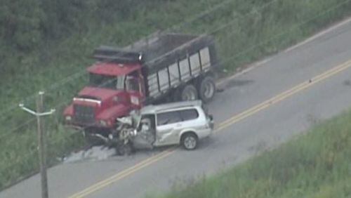 This fatal crash in DeKalb County involved an SUV and a dump truck. (Credit: Channel 2 Action News)