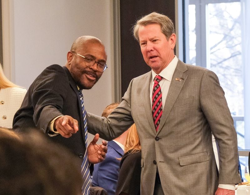Tino Kemp of Jackson EMC greets Gov. Brian Kemp at a policy breakfast Monday in Athens. The governor and first lady Marty Kemp spoke on recent events in the state and provided updates on matters such as the economy and public safety. (Nell Carroll for The Atlanta Journal-Constitution)