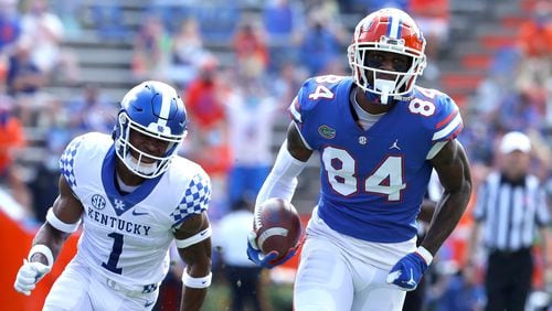Florida tight end Kyle Pitts (84) runs after catching a pass to score a touchdown during an NCAA college football game against Kentucky in Gainesville, Fla. Nov. 28, 2020. (Brad McClenny/The Gainesville Sun)
