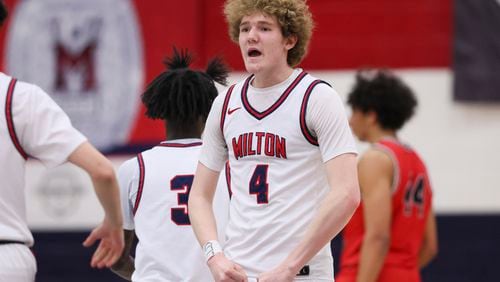Milton forward Braxton Giesler (4) reacts after a play by a teammate during the second half against North Gwinnett in their first round of the boys’ Class 7A playoffs at Milton High School, Wednesday, February 21, 2024, in Milton, Ga. Milton won 67-54. (Jason Getz / jason.getz@ajc.com)