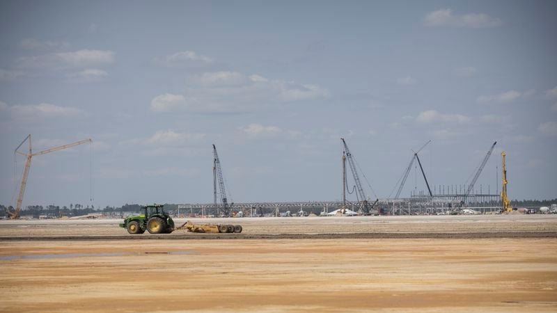 ELLABELL, GA. - JUNE 5, 2023: A road grater levels a road in the middle of the Hyundai Metaplant site, Monday, June 5, 2023, in Ellabell, Ga. (AJC Photo/Stephen B. Morton)