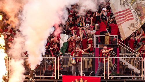 Atlanta United's supporters celebrate during Sunday's game against NYCFC at Mercedes-Benz Stadium.