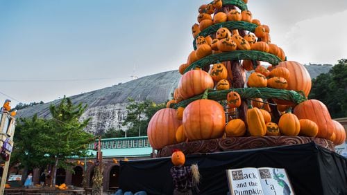 This pumpkin tower turns into a glow-in-the-dark attraction at night.