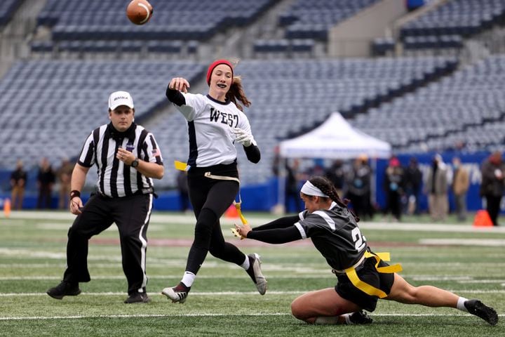 West Forsyth quarterback Haylee Dornan attempts a pass against Hillgrove defender Kaylan Sacus during the first half of the Class 6A-7A Flag Football championship at Center Parc Stadium Monday, December 28, 2020 in Atlanta, Ga.. JASON GETZ FOR THE ATLANTA JOURNAL-CONSTITUTION