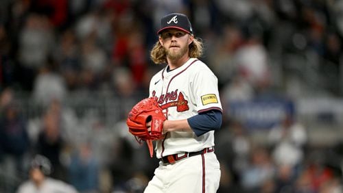Atlanta Braves pitcher Pierce Johnson (38) throws a pitch during the ninth inning of home opener baseball game at Truist Park, Friday, April 5, 2024, in Atlanta. Atlanta Braves won 5-4 in the tenth inning. (Hyosub Shin / Hyosub.Shin@ajc.com)