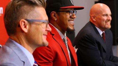 Atlanta Falcons General Manager Thomas Dimitroff, left, attends a news conference with first-round draft pick Vic Beasley, center, and head coach Dan Quinn at the Falcons training facility on Friday, May 1, 2015, in Flowery Branch, Ga. (Curtis Compton/Atlanta Journal-Constitution via AP) MARIETTA DAILY OUT; GWINNETT DAILY POST OUT; LOCAL TELEVISION OUT; WXIA-TV OUT; WGCL-TV OUT All smiles: Dimitroff, Beasley, Quinn. (Curtis Compton/AJC photo)