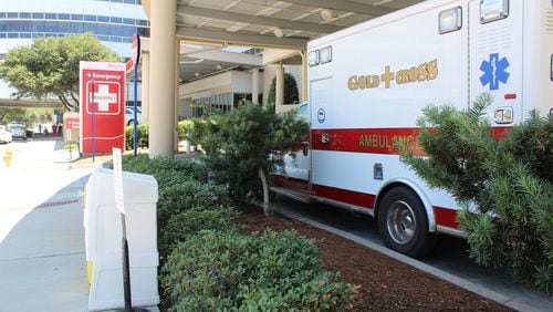 A Gold Cross ambulance waits outside of the emergency room at Augusta University Medical Center. FILE PHOTO