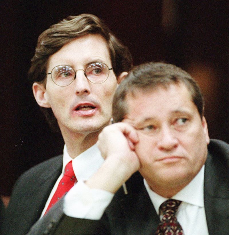 Fred Tokars (left) and his attorney Jim Berry listen to arguments during a pretrial hearing in Cobb County Superior Court in November 1994.