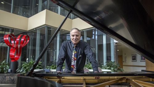 Dr. Gad Brosch at the piano on Monday, Feb.27, 2017 in the lobby of the Sentara Heart Hospital in Norfolk, Va. (Bill Tiernan/The Virginian-Pilot/TNS)
