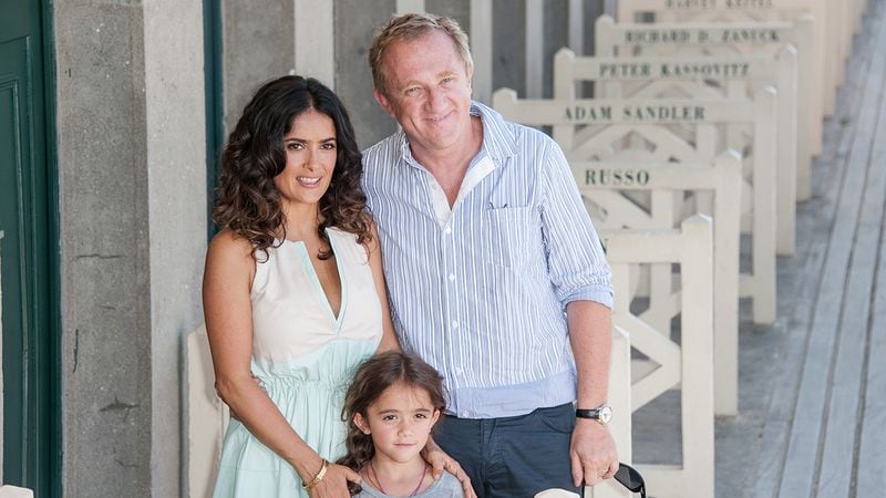 Salma Hayek poses her husband Francois-Henri Pinault with their daughter Valentina Paloma Pinault during the 38th Deauville American Film Festival in 2012 in Deauville, France.