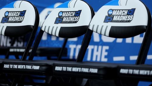 The March Madness logo on bench seats as Indiana meets Miami during the second round of the NCAA Tournament at MVP Arena on March 19, 2023, in Albany, New York. (Rob Carr/Getty Images/TNS)