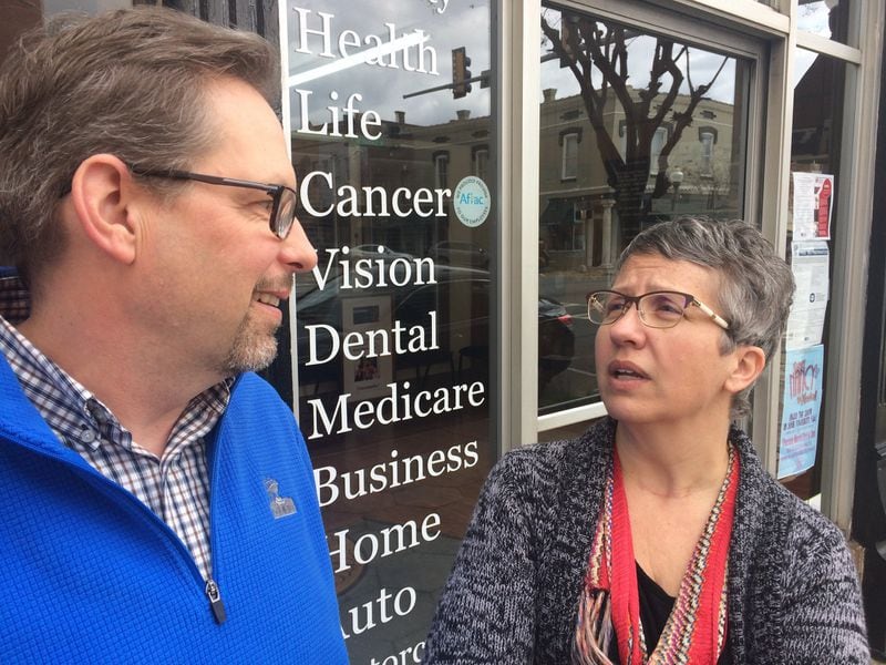 Kirk Lyman-Barner, left, is an insurance agent in Americus who specializes in Obamacare policies. He is pictured outside his office with his wife, Cori. They also are enrolled in an Obamacare policy and worry that the proposed GOP health care plan would cost them more.