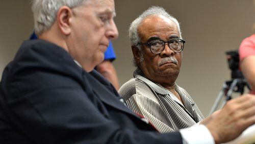 Former Gov. Roy Barnes (left) speaks as Rep. Tyrone Brooks looks during a hearing on Friday, June 28, 2013. Former Gov. Roy Barnes earlier Friday accused Olens of toying with the state Constitution by barring him from calling witnesses at a hearing to decide if state Rep. Tyrone Brooks should be suspended from office.