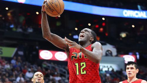 March 26, 2017, Atlanta: Atlanta Hawks Taurean Prince, getting his first start, drives to the basket for two past Brooklyn Nets forward K.J. McDaniels in a NBA basketball game on Sunday, March 26, 2017, in Atlanta. Curtis Compton/ccompton@ajc.com