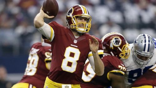 Washington Redskins quarterback Kirk Cousins (8) looks to pass under pressure in the first half of an NFL football game against the Dallas Cowboys on Sunday, Jan. 3, 2016, in Arlington , Texas. (AP Photo/Tim Sharp)
