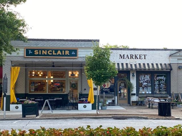 Exterior of The Sinclair and Community Roots Market in Madison, Georgia.