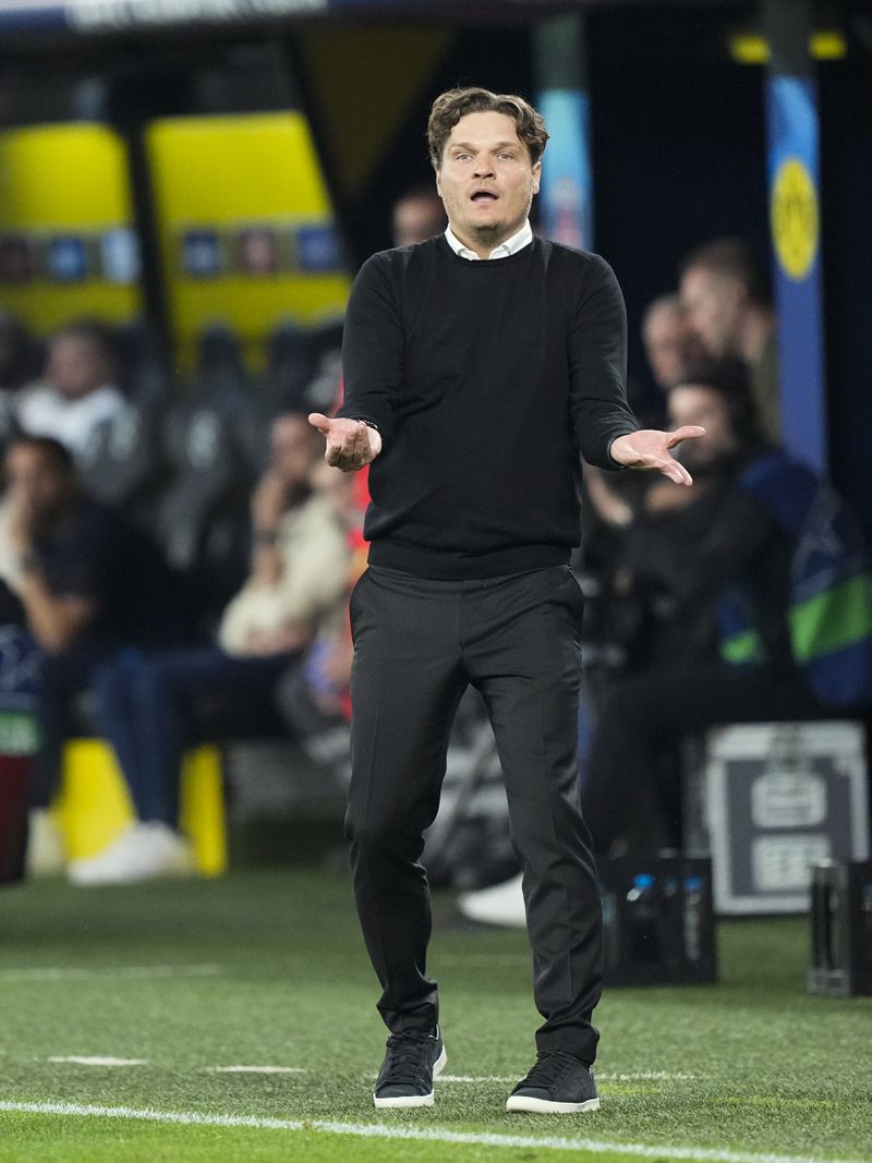 Dortmund's head coach Edin Terzic protests to referee Anthony Taylor during the Champions League semifinal first leg soccer match between Borussia Dortmund and Paris Saint-Germain at the Signal-Iduna Park in Dortmund, Germany, Wednesday, May 1, 2024. (AP Photo/Martin Meissner)