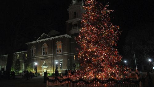 The huge decorated Christmas Tree lit up the court yard at the Historic Courthouse in Lawrenceville, Georgia Saturday, Dec. 11, 2010.   FILE PHOTO