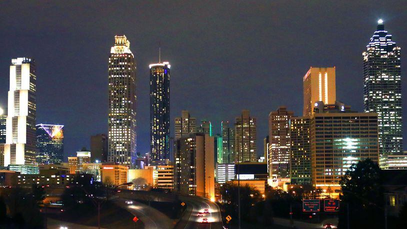 The Atlanta skyline shown from the Jackson Street bridge Thursday night, January 29, 2015. PHOTO / JASON GETZ