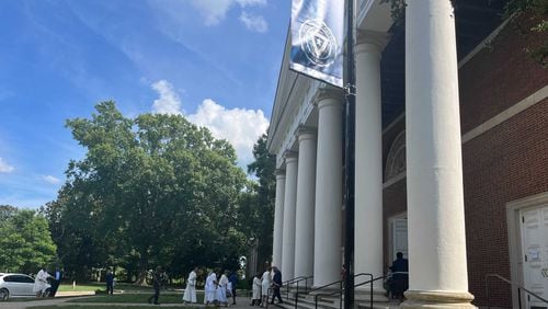 Mourners walk inside Spelman College's Sisters Chapel on Tuesday for a service celebrating the life of Christine King Farris, who taught at the college for nearly a half-century. (Avani Kalra/Avani.Kalra@ajc.com)