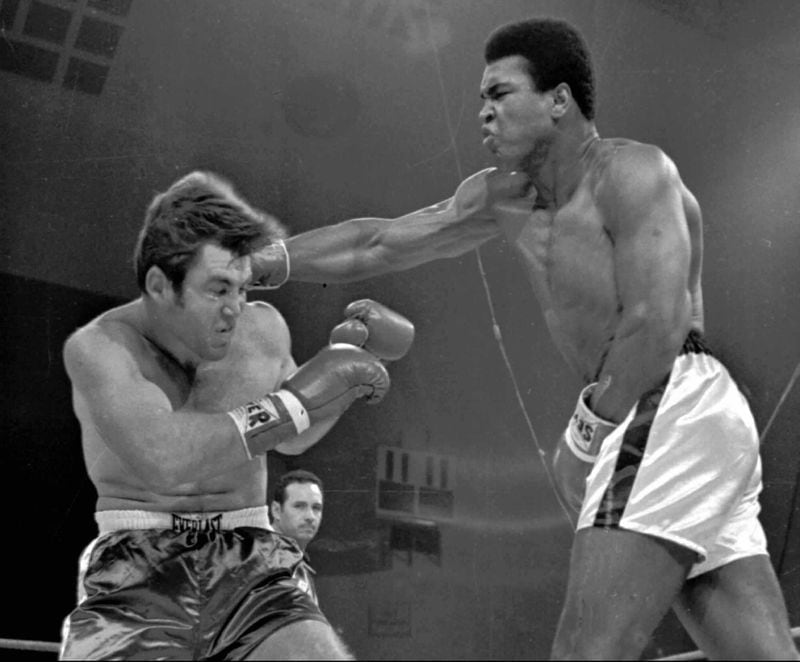 Muhammad Ali hits Jerry Quarry with a hard right during their fight Oct. 26, 1970, in Atlanta. Ali was declared the winner in the non-title match. AP FILE