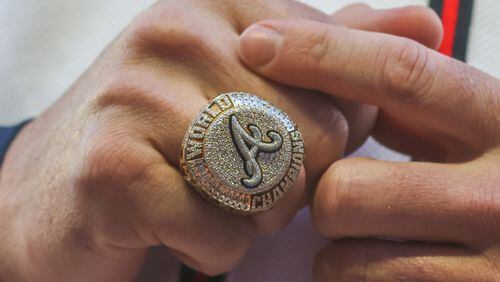 Braves relief pitcher Tyler Matzek (68) wears his World Series ring before a game against Cincinnati Reds at Truist Park on Saturday, April 9, 2022, in Atlanta.  Branden Camp/For the Atlanta Journal-Constitution