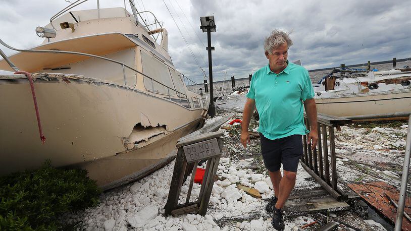 A resident of the St. Marys area along the Georgia coast, Jay Lassiter surveys the remains of boats and docks there after they were destroyed by Hurricane Irma in September of 2017. Irma was one of three hurricanes that year that damaged Georgia enough to draw federal grants to local health centers. (PHOTO by Curtis Compton/ccompton@ajc.com)
