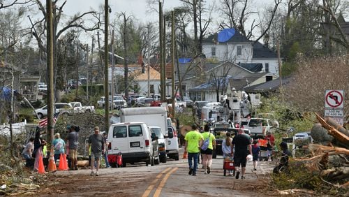 Cleanup from the tornado in Coweta County will continue for weeks, with state and county crews working 12 hours a day to remove trees and an estimated 500,000 cubic yards of debris.