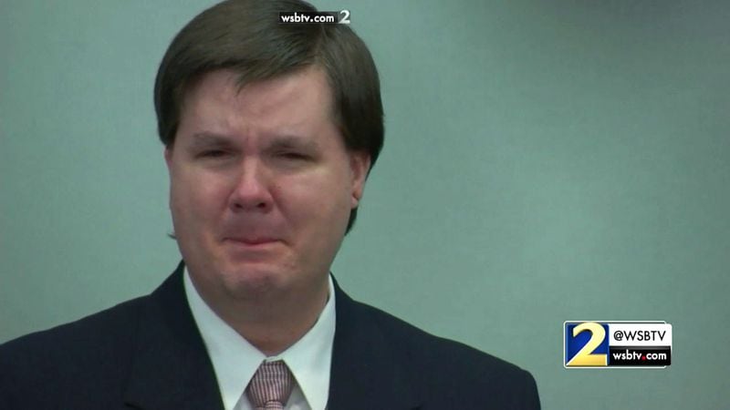 Justin Ross Harris stands and cries as the court lets out for lunch after his defense finished its closing argument during Harris' murder trial at the Glynn County Courthouse in Brunswick, Ga., on Monday, Nov. 7, 2016. (screen capture via WSB-TV)