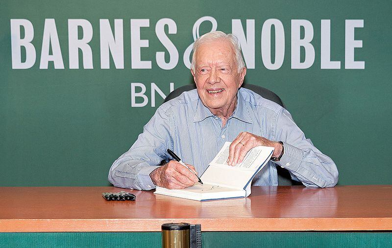 NEW YORK, NY - JULY 07: Former U.S. President Jimmy Carter signs copies of his book "Full Life: Reflections at Ninety" at Barnes & Noble, 5th Avenue on July 7, 2015 in New York City. Carter was 39th President of the United States from 1977 to 1981 and was awarded the 2002 Nobel Peace Prize. (Photo by D Dipasupil/Getty Images)