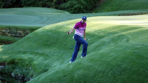 Sergio Garcia's march to his first major title at this year's Masters didn't come without some adventure on the bank fronting the green at No. 13. (Curtis Compton/ AJC)