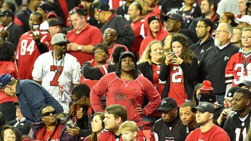 Atlanta Falcons fans react at the end of the 4th quarter in an NFL football game at the Georgia Dome on Sunday, December 4, 2016. Kansas City Chiefs won 29 - 28 over the Atlanta Falcons. HYOSUB SHIN / HSHIN@AJC.COM