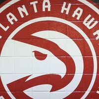 102715 ATLANTA: -- A new Hawks logo is painted on the tunnel wall leading out to the court for the first regular season basketball game "home opener" on Tuesday, Oct. 27, 2015, in Atlanta.  Curtis Compton / ccompton@ajc.com