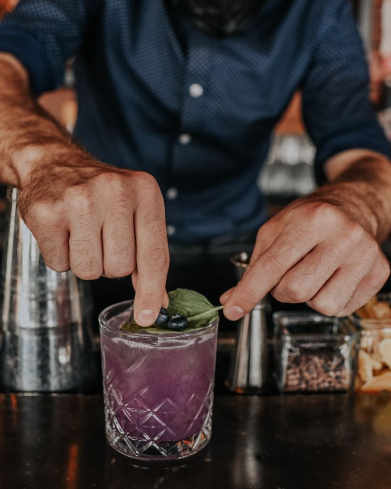 The pretty lavender-hued Violet Delights at the Regent Cocktail Club conjures up a dreamy springtime meadow. Courtesy of Jamestown.