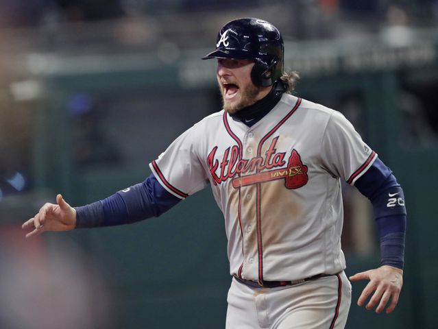 Photos: Braves stun Indians with Game 2 comeback