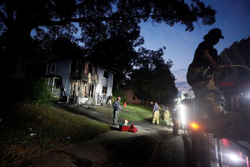 A man and woman were killed in an early Thursday morning house fire on Pope Street in southwest Atlanta. (BOB ANDRES / BANDRES@AJC.COM)