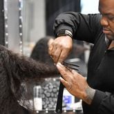 Celebrity hairstylist Derek J. styles his client Miracle Jenkins’ hair at J Spot Hair Salon, Thursday, Feb. 2, 2023, in Buckhead. (Hyosub Shin / Hyosub.Shin@ajc.com)