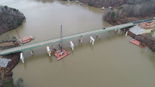 Georgia Department of Transportation crews began March 22 setting the 115-foot-long beams for the new Longstreet Bridge over the Chattahoochee river in Gainesville. (Courtesy GDOT)