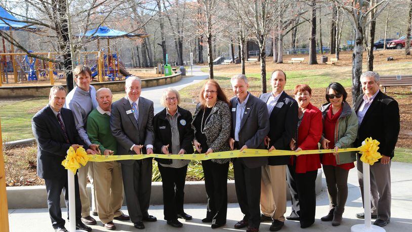 Gwinnett County and Peachtree Corners officials celebrate the completion of renovations to Jones Bridge Park in Peachtree Corners. Courtesy Gwinnett County Parks and Recreation