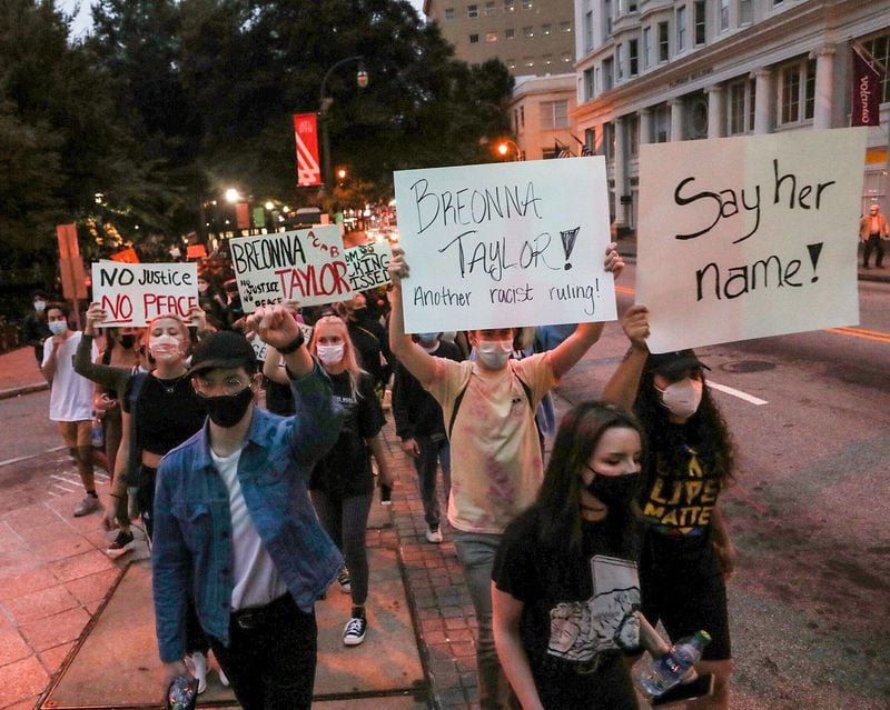 Protesters march down Peachtree Street on Wednesday, Sept. 23, 2020, after the ruling in the death of Breonna Taylor. (Alyssa Pointer / Alyssa.Pointer@ajc.com)
