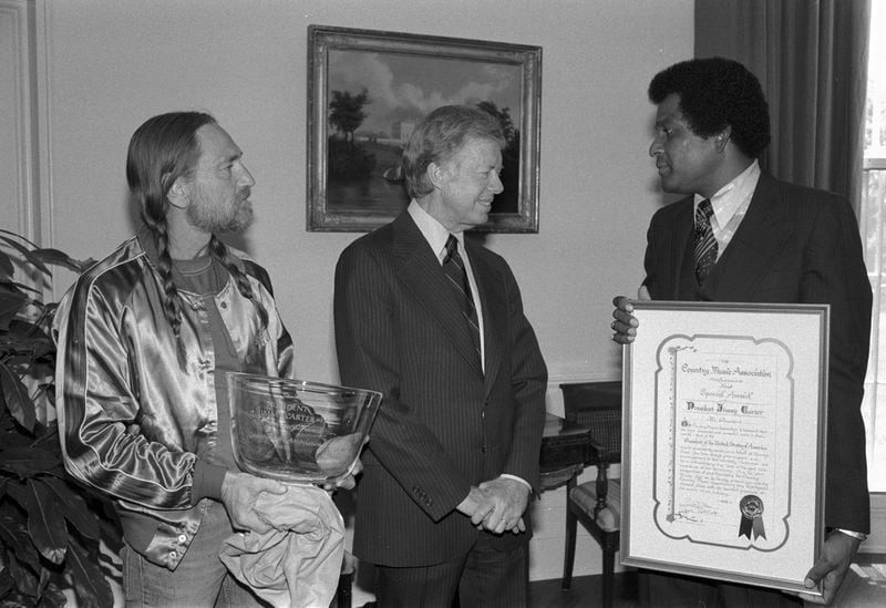 Charley Pride (right) was with Willie Nelson to visit President Jimmy Carter for the presentation of the first Special Country Music Association Award in the Oval Office on May 15, 1979. (Jimmy Carter Library)