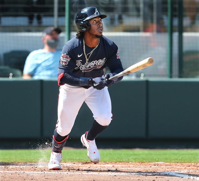 Atlanta Braves second baseman Ozzie Albies hits a solo home run against the Baltimore Orioles during the fourth inning Wednesday, March 3, 2021, at CoolToday Park in North Port, Fla. (Curtis Compton / Curtis.Compton@ajc.com)