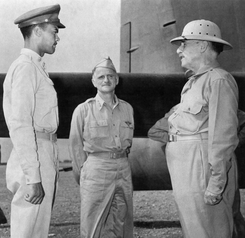 From left, Army Air Forces Lt. Col. Benjamin Davis, 99th Fighter Squadron commander, meets with Army Air Forces Lt. Gen. Carl Spaatz, commander of the Mediterranean Allied Air Forces, and Secretary of War Henry Stimson in Tunis, Tunisia, sometime between 1942 and 1945.