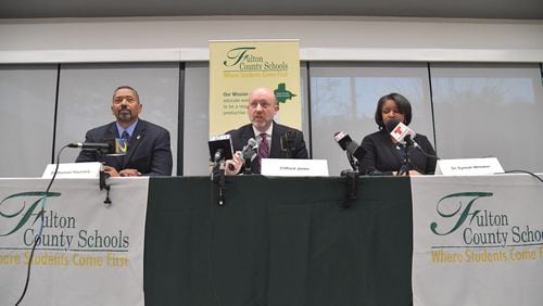 Fulton County Schools officials, from left, Shannon Flounnory, executive director of safety and security; Cliff Jones, chief academic officer; and Gyimah Whitaker, area superintendent, speak to reporters during a Feb. 21, 2019  news conference about drug-laced edibles brought to Sandtown Middle School last week.