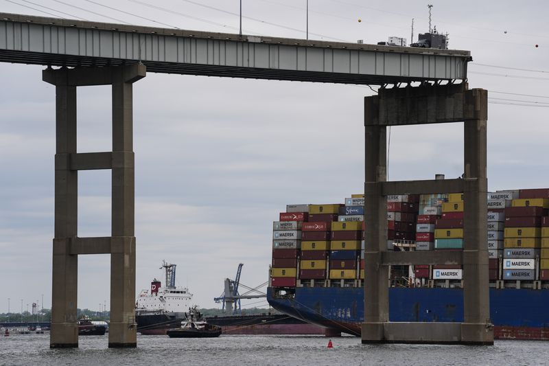 A bulk carrier moves through a newly opened deep-water channel in Baltimore after being stuck in the harbor since the Francis Scott Key Bridge collapsed four weeks ago, Thursday, April 25, 2024. (AP Photo/Matt Rourke)