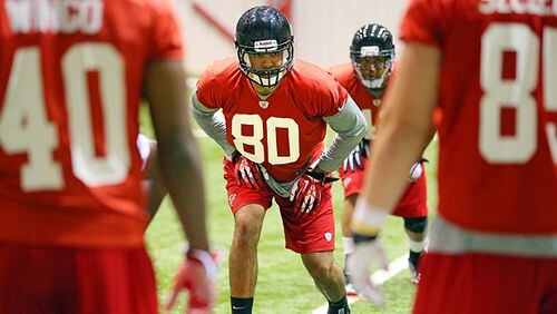 050513 FLOWERY BRANCH: Falcons rookie tight end Levine Toilolo (80), Stanford, runs drills during rookie minicamp on Sunday, May 5, 2013, in Flowery Branch. CURTIS COMPTON / CCOMPTON@AJC.COM